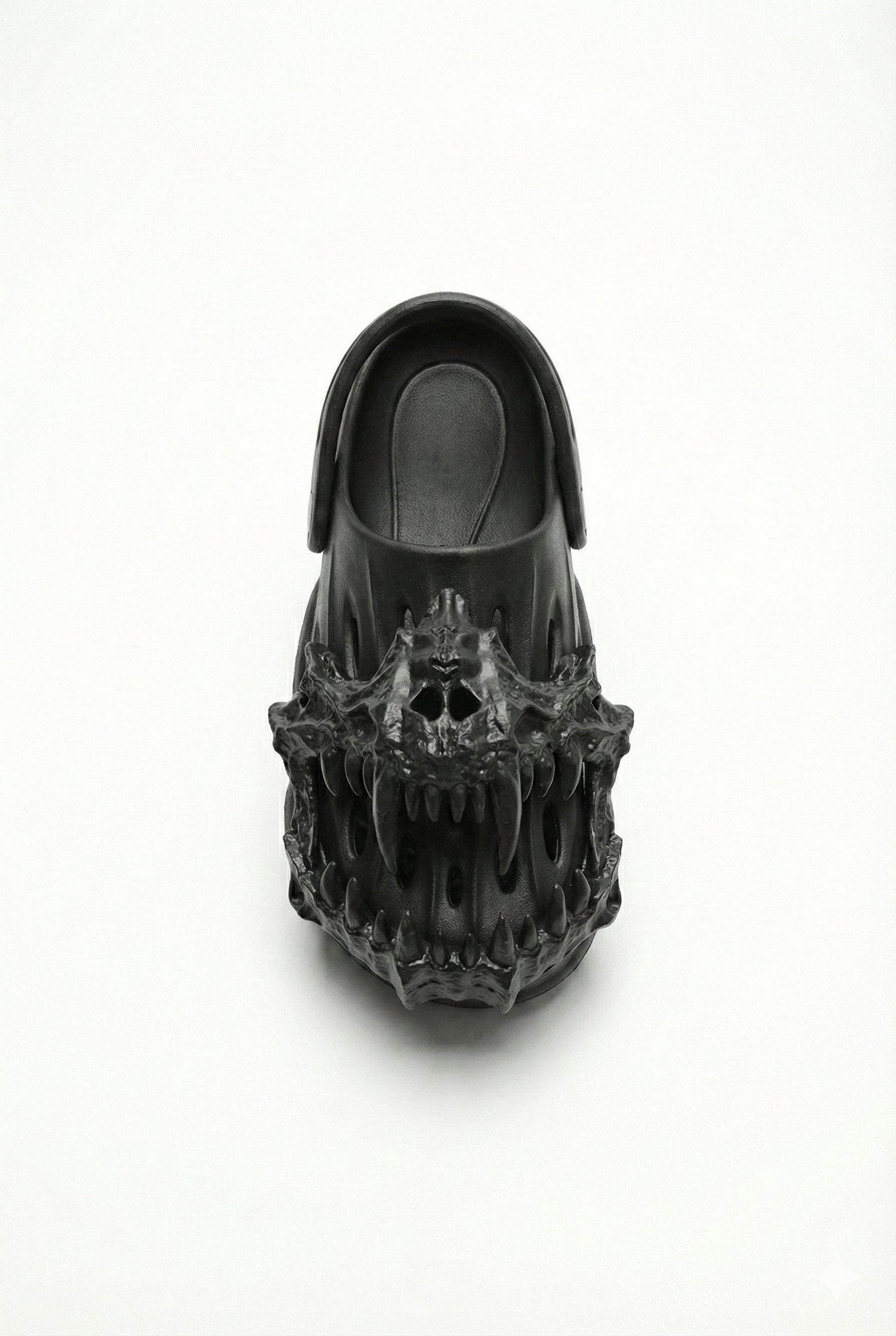 Black clog shoe with a unique design on a white background